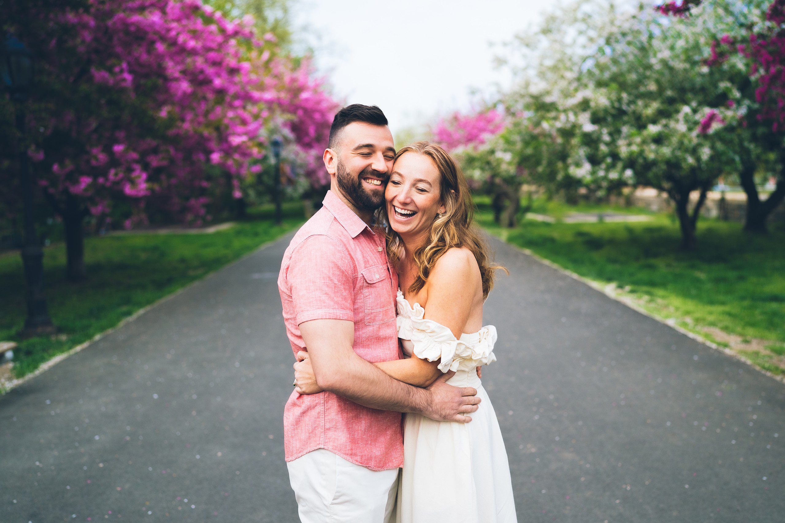 Cherry Blossom in NYC: Riverside Park Engagement Photos by Sascha Reinking Photography