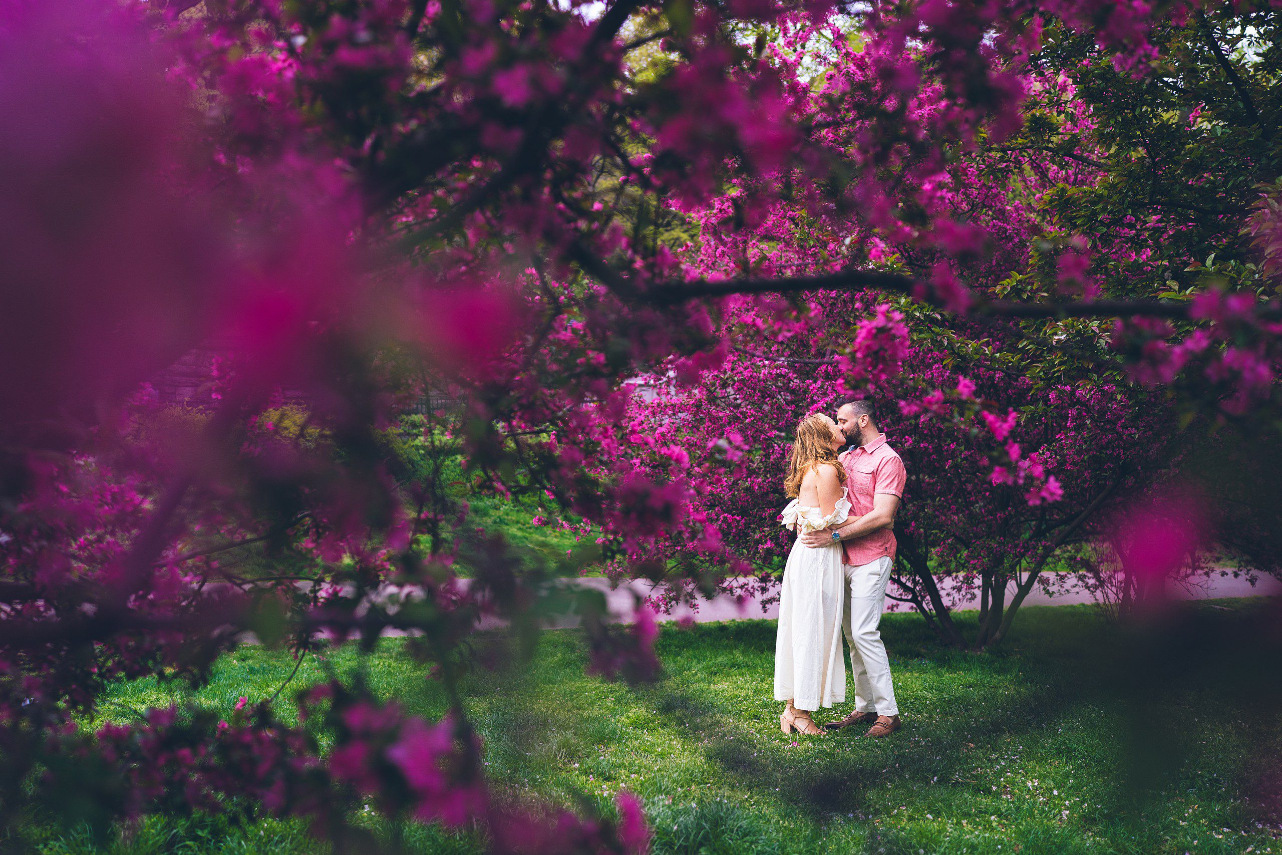 Cherry Blossom in NYC: Riverside Park Engagement Photos by Sascha Reinking Photography