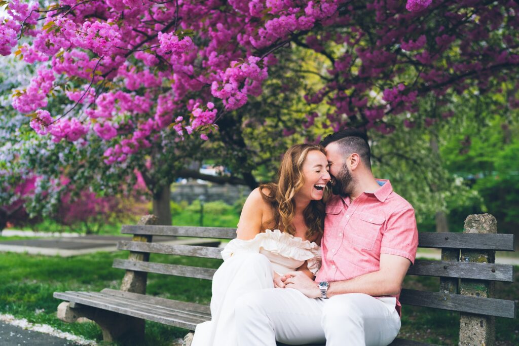 Cherry Blossom in NYC: Riverside Park Engagement Photos by Sascha Reinking Photography