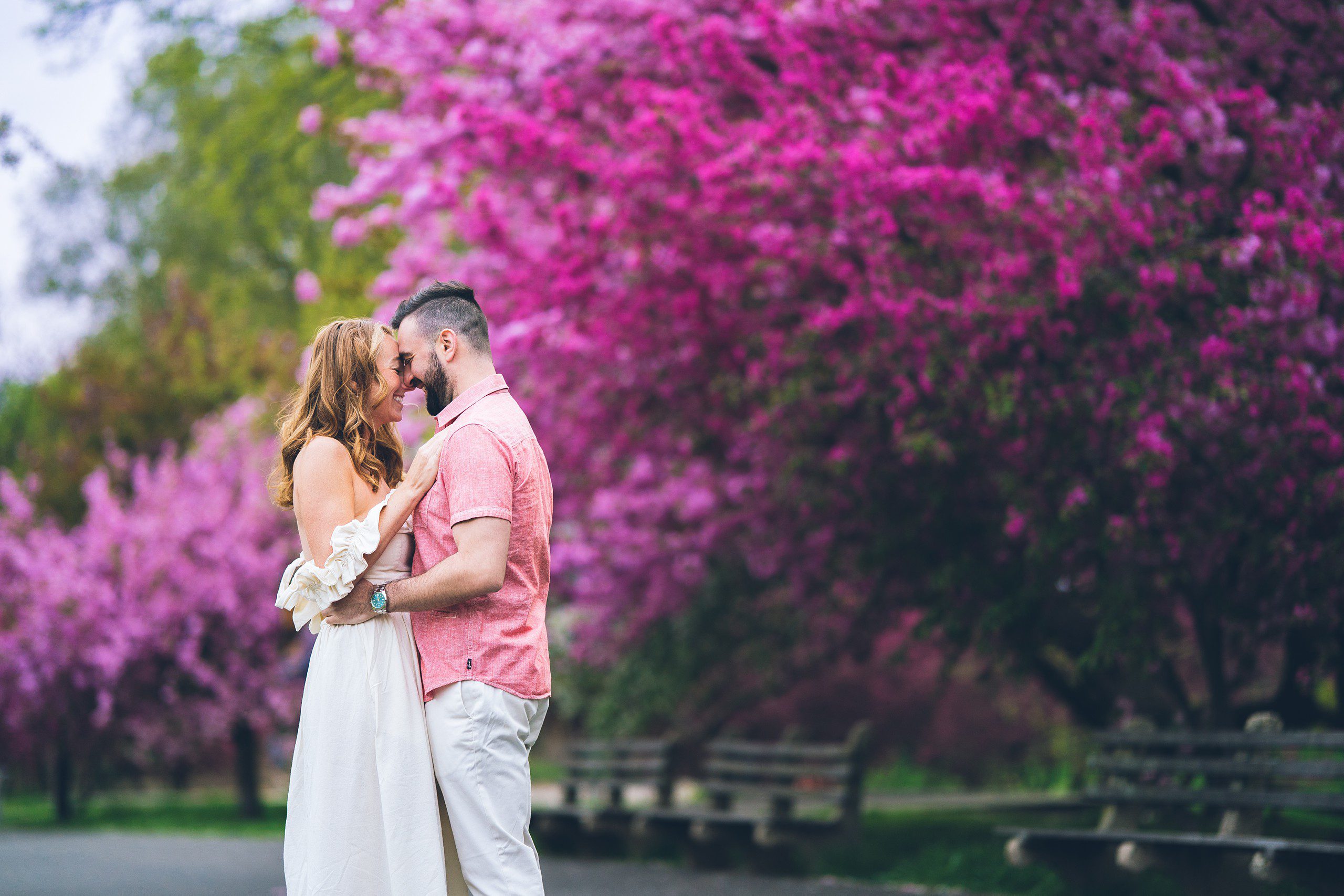 Cherry Blossom in NYC: Riverside Park Engagement Photos by Sascha Reinking Photography